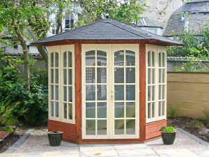 Traditional Summerhouse for garden Hexagonal Dunster House Vantage Customer Image 2 - Red stain