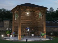 Leviathan Wooden Walled Gazebo with Slatted Panels 2.5m x 2.5m Night Time