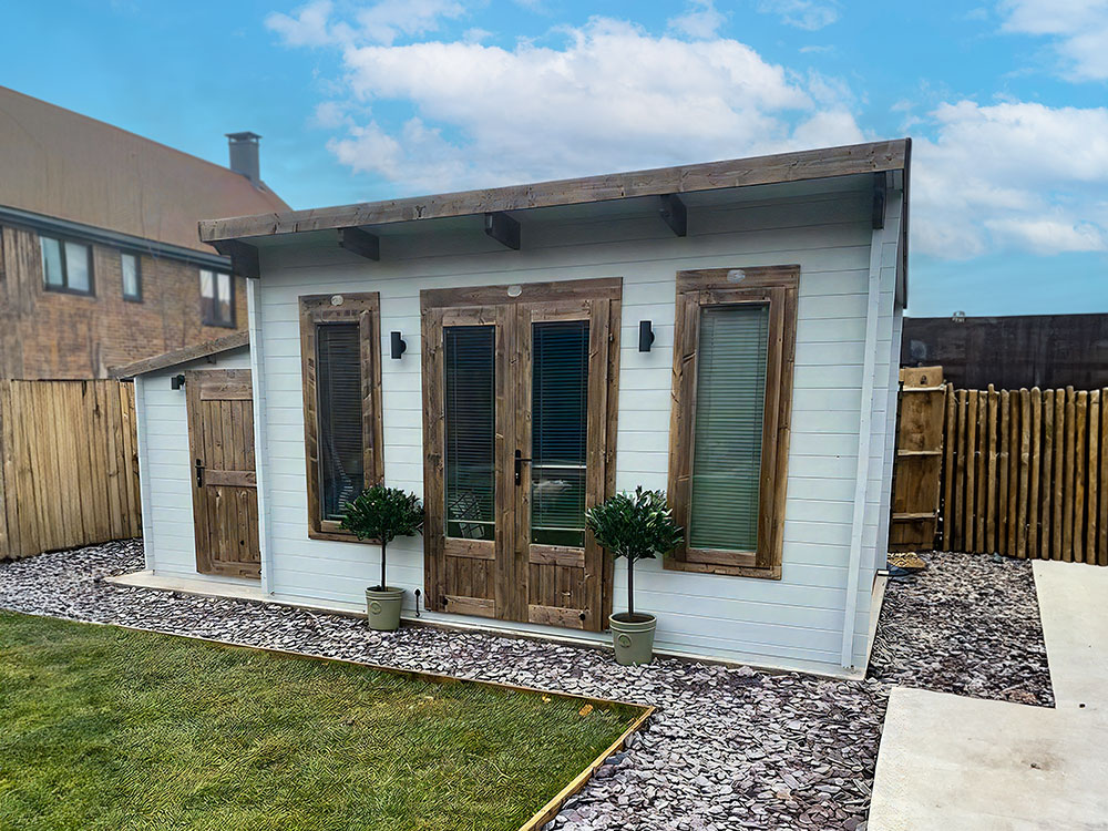 5.5m x 3m Terminator Log Cabin with SideStore Shed in Customer Garden