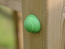 green round safety cap on climbing frame