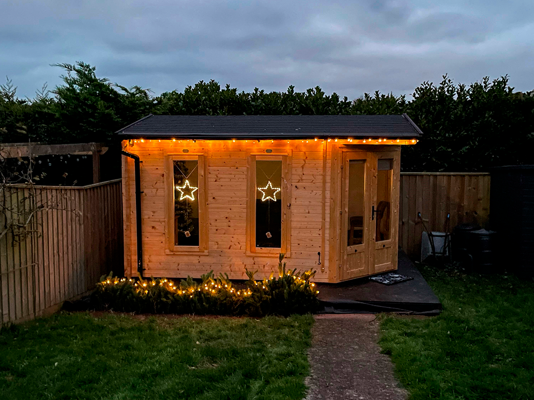 DaftBadger log cabin decorated for the festive period