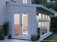 Addroom Conservatory Alternative 5m x 2.5m Side Door and Glazed Wall White uPVC at Night