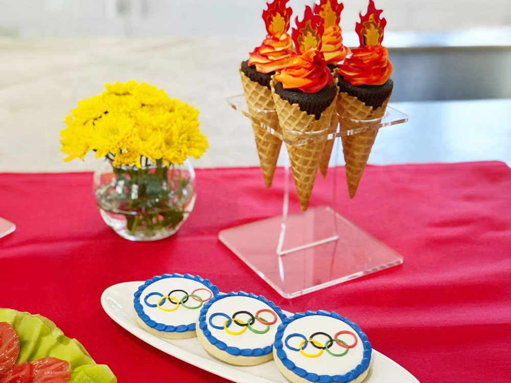 Table set up with Olympics themed food decorations