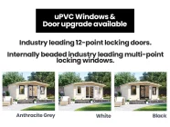 Log Cabin uPVC windows and doors upgrade available industry leading 12 point locking doors internally beaded toughened glass double glazed window